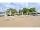 Outdoor seating area with umbrellas, tables, and chairs for residents' enjoyment at 5850 21St N St # 12, St Petersburg, FL 33714