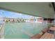 Covered shuffleboard courts with benches, easily accessible to residents at 5850 21St N St # 12, St Petersburg, FL 33714