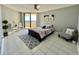Bedroom featuring a ceiling fan, a comfortable bed and balcony access with beautiful views at 5940 Pelican Bay S Plz # 1105, Gulfport, FL 33707