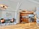A view of the kitchen featuring wood cabinets, stainless steel appliances, and granite countertops at 5940 Pelican Bay S Plz # 1105, Gulfport, FL 33707