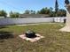 Spacious backyard with a black firepit at 6221 13Th N Ave, St Petersburg, FL 33710