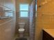 Bright bathroom with a toilet near a window at 6221 13Th N Ave, St Petersburg, FL 33710