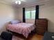 Bedroom with hardwood flooring and natural light at 6221 13Th N Ave, St Petersburg, FL 33710
