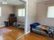 Cozy bedroom with hardwood floors, mirrored closet doors and simple decor at 6221 13Th N Ave, St Petersburg, FL 33710