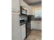 Well-equipped kitchen featuring stainless steel appliances and bright tile backsplash at 6221 13Th N Ave, St Petersburg, FL 33710
