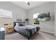 Cozy bedroom featuring a neutral color palette, comfortable bed, and a mounted TV with relaxing views at 6313 Brevada Ln, Apollo Beach, FL 33572