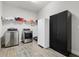 Practical laundry room featuring modern washer, dryer, and ample storage at 6313 Brevada Ln, Apollo Beach, FL 33572