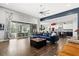 Spacious living area featuring an open layout to kitchen, dining and access to the screened patio at 6313 Brevada Ln, Apollo Beach, FL 33572