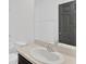 Bathroom featuring a large mirror, vanity with a sink, and neutral decor at 7029 White Treetop Pl, Riverview, FL 33578