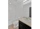 Bright bathroom with a tub and shower combination and vanity with a light countertop at 7029 White Treetop Pl, Riverview, FL 33578
