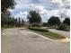 The Baywood community entrance sign is displayed with beautiful landscaping at the entry of the neighborhood at 7029 White Treetop Pl, Riverview, FL 33578