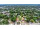 High-angle view of the property nestled in a green neighborhood, underscoring its peaceful setting and proximity to local services at 8505 N Brooks St, Tampa, FL 33604