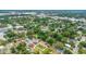 Lovely aerial capture showcases the property set within a vibrant neighborhood, near essential services and community hotspots at 8505 N Brooks St, Tampa, FL 33604