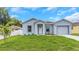 Attractive home exterior with a one car garage at 8505 N Brooks St, Tampa, FL 33604