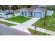 Beautifully landscaped front yard leading to a well kept single Gathering home at 8505 N Brooks St, Tampa, FL 33604