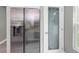 Kitchen featuring stainless steel fridge and decorative glass door at 8505 N Brooks St, Tampa, FL 33604