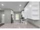 Kitchen island and view to other kitchen appliances at 8505 N Brooks St, Tampa, FL 33604