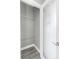 Walk-in pantry with gray wood floor and shelving at 8505 N Brooks St, Tampa, FL 33604