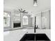 View into living space featuring fireplace from kitchen featuring island with sink at 8818 Poe Dr, Hudson, FL 34667