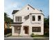 Inviting two-story home featuring a covered entryway and classic architectural details at 921 12Th N St, St Petersburg, FL 33705