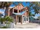 Two-story home under construction featuring modern windows and durable ZIP system sheathing for weather protection at 921 12Th N St, St Petersburg, FL 33705