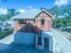 Home under construction with installed ZIP system sheathing, a basement-level entrance, and blue skies above at 921 12Th N St, St Petersburg, FL 33705