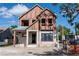 Two-story home under construction featuring modern windows and durable ZIP system sheathing for weather protection at 921 12Th N St, St Petersburg, FL 33705
