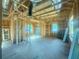 Unfinished interior construction showcasing the home's frame, window openings, and potential for customization at 921 12Th N St, St Petersburg, FL 33705