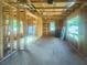 Interior under construction with wooden frames, large windows allowing ample sunlight, and a bright open layout at 921 12Th N St, St Petersburg, FL 33705