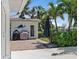 Exterior view of outdoor shed with brick patio and grill at 1112 38Th Ne Ave, St Petersburg, FL 33704