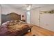 Main bedroom with an en suite bathroom and large bed at 12202 Meadowbrook Ln, Hudson, FL 34667