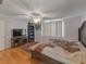 Cozy main bedroom with hardwood floors and ample closet space at 12202 Meadowbrook Ln, Hudson, FL 34667