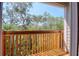 Balcony provides a peaceful retreat with views of the surrounding foliage at 1353 Curlew Rd, Dunedin, FL 34698