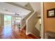 Living room interior view with staircase at 1353 Curlew Rd, Dunedin, FL 34698