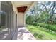 Exterior patio view with concrete flooring and backyard area at 1353 Curlew Rd, Dunedin, FL 34698