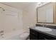 Bathroom featuring shower and tub combination and a large vanity at 1572 84Th N Ave, St Petersburg, FL 33702