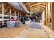 Spacious unfinished attic with visible rafters and insulation along with installed ductwork at 1827 Venetian Point Dr, Clearwater, FL 33755