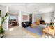Open-concept living room with modern decor and plenty of natural light at 1827 Venetian Point Dr, Clearwater, FL 33755