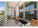 Inviting porch with seating area, perfect for enjoying the outdoors at 1827 Venetian Point Dr, Clearwater, FL 33755