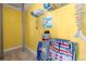 Storage room with beach decor, ample shelving, and a view of the interior at 1827 Venetian Point Dr, Clearwater, FL 33755