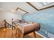 Spacious game room featuring a foosball table and a skylight, perfect for entertaining Gathering and friends at 19727 Gulf Blvd # 207, Indian Shores, FL 33785