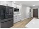 Modern kitchen with sleek cabinetry, stainless steel appliances, and a convenient layout, perfect for cooking and entertaining at 200 98Th Ne Ave, St Petersburg, FL 33702