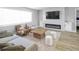 Bright living room with fireplace, sleek furniture and modern decor at 200 98Th Ne Ave, St Petersburg, FL 33702