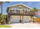 Charming home with two-car garage and upper deck at 224 Ontario Ave, Crystal Beach, FL 34681