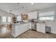 Bright, modern kitchen with an island bar at 224 Ontario Ave, Crystal Beach, FL 34681