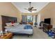 Expansive main bedroom with a ceiling fan and a bright, airy ambiance at 2630 Grand Lakeside Dr, Palm Harbor, FL 34684
