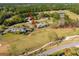 Aerial view showcasing the property's proximity to the golf course and the serene neighborhood at 29844 Baywood Ln, Wesley Chapel, FL 33543