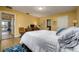 Bedroom with blue rug and wood furniture at 29844 Baywood Ln, Wesley Chapel, FL 33543