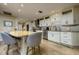 Bright kitchen with granite countertops, stainless steel appliances and gray backsplash at 29844 Baywood Ln, Wesley Chapel, FL 33543