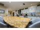 Bright kitchen with granite countertops, stainless steel appliances and gray backsplash at 29844 Baywood Ln, Wesley Chapel, FL 33543